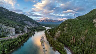 Flathead River, Hungry Horse, Montana. USA. Near western entrance of Glacier National Park. Serene River Valley at Sunset