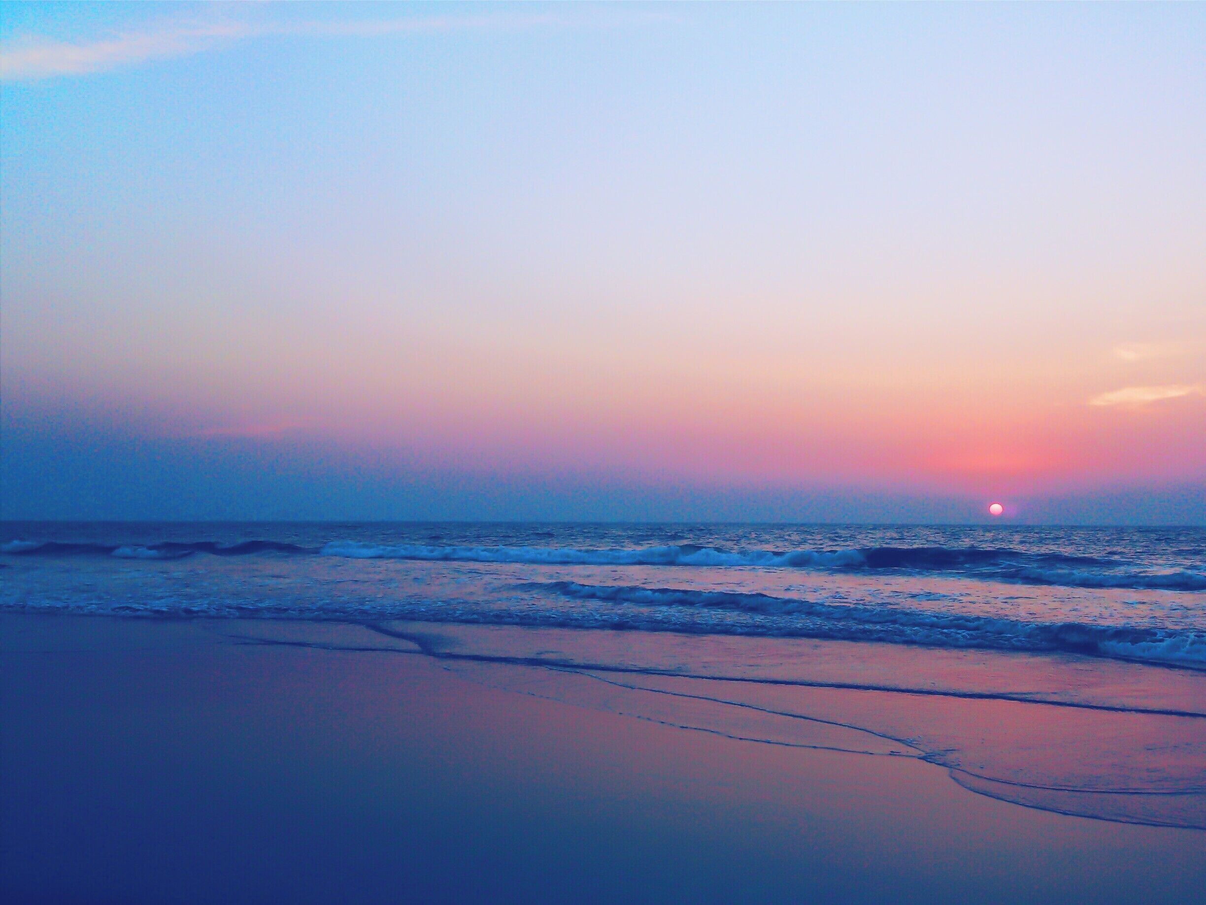 The sunset, the twilight zone of the day, the ever fading light turning into the night, the soft splashing of the waves the shore, the ripples on the water, the salty sea breeze, nostalgia. The reminder of why home is so special. #blue #trover