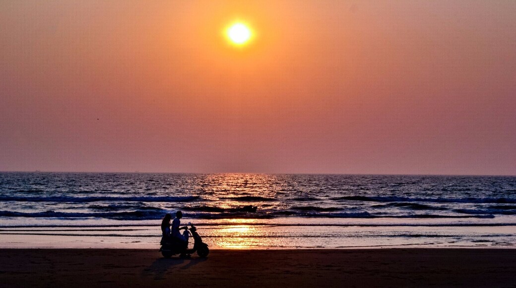 Evanescent evening in Goa. Love this silhouette of the scooter couple driving along the beach as the sun sets. Couldn't be more romantic #relationshipgoals #BeachBound #ashvembeach #goa #sunset #chasingsunsets #beach #arabiansea #bruisedpassports