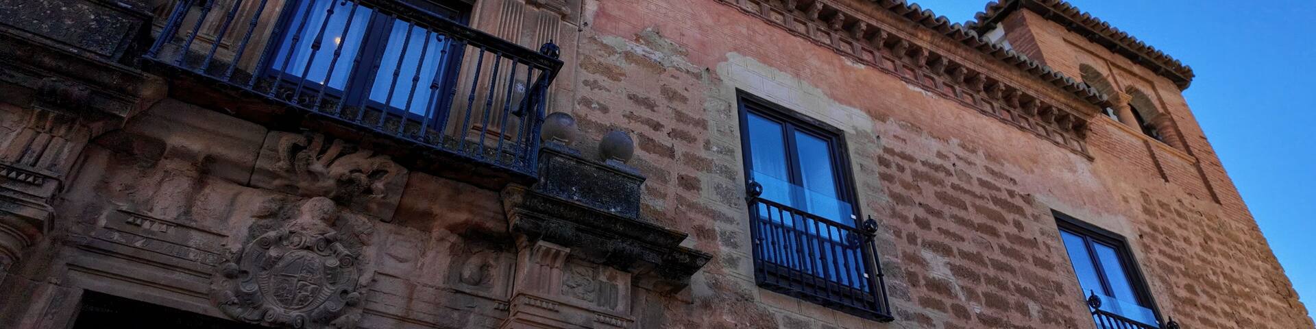 Mondragon Palace facade with blue sky in Ronda, Spain