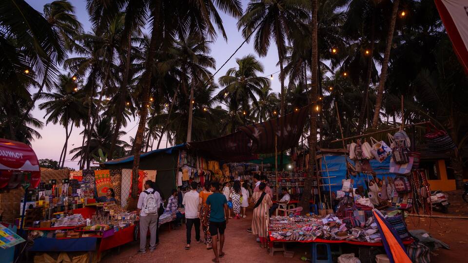 Sunset at the famous Tuesday flee Market in Anjuna, Goa, India. It is the major tourist attraction in north Goa, India