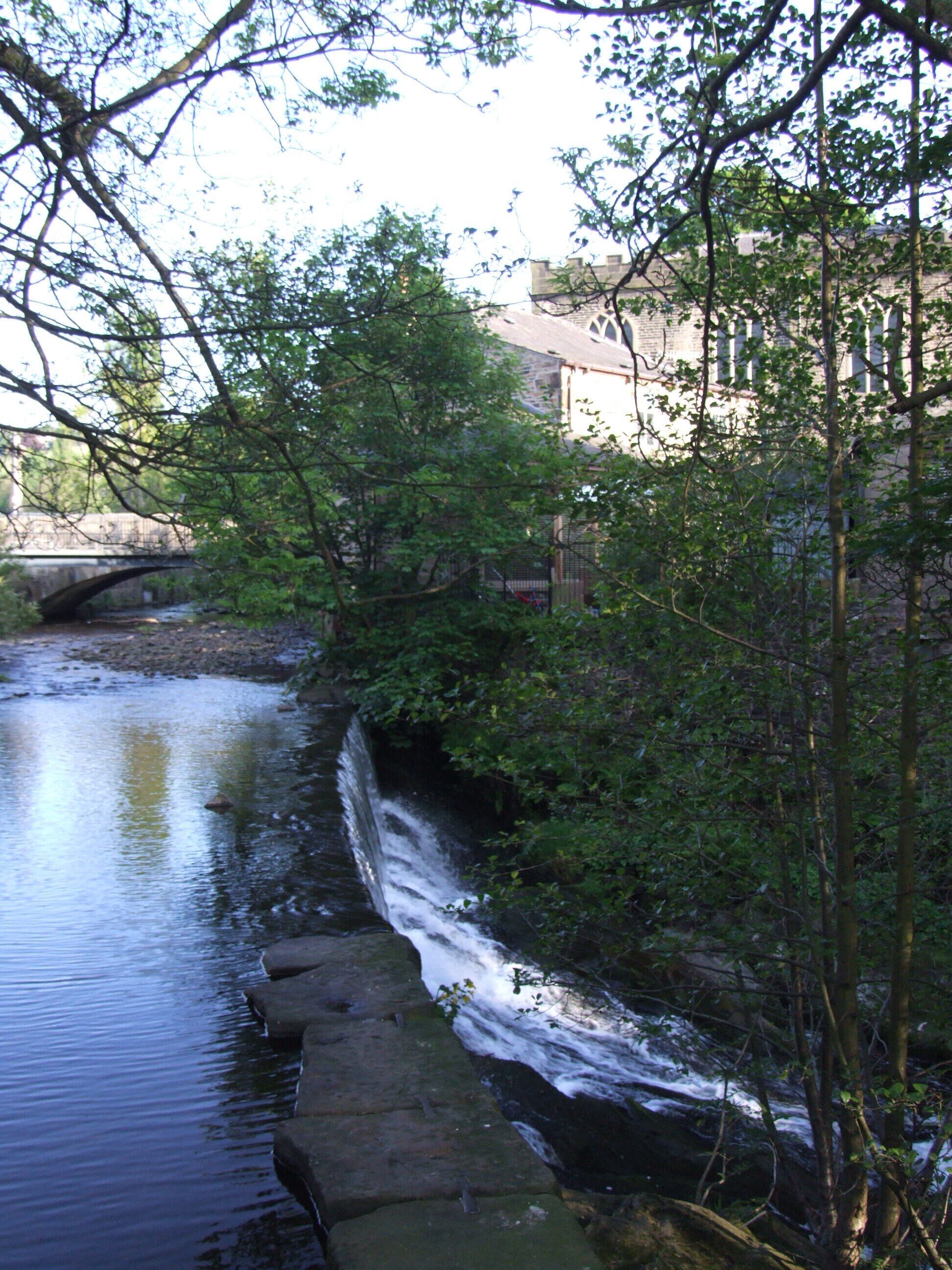 Hayfield is a village in the Peak District. Weir on River Sett, church behind Camera location 53° 22′ 47.64″ N, 1° 56′ 45.24″ W View this and other nearby images on: OpenStreetMap - Google Earth 53.379900; -1.945900