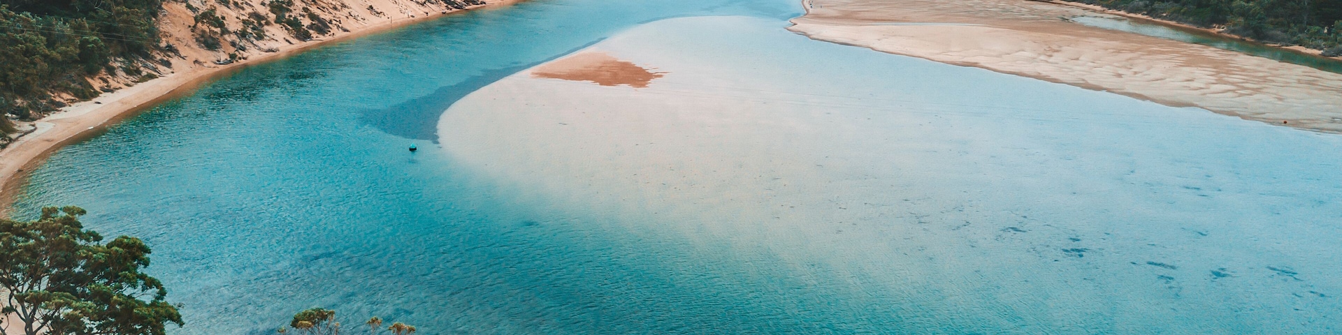 Incoming storm over the saltwater coastal inlet landscape scene
