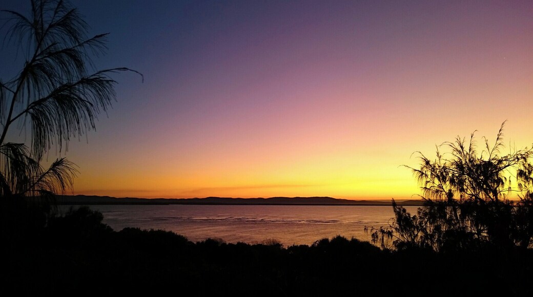 From the lookout at Seventeen Seventy you can see the moon rise on one side of you, and simultaneously see the sunset on the other.... and what a sunset it is too.
To reach the lookout, follow the (only) road through the township of Seventeen Seventy and up the hill. When you reach the x intersection, turn left and follow to the carpark. From the carpark you can see the moos rise and sunset, and take a few short walks around this magnificent headland.
#Colorful #roadtrip