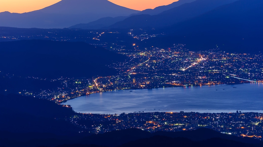 Lights of Suwa city and Mt.Fuji at dawn
