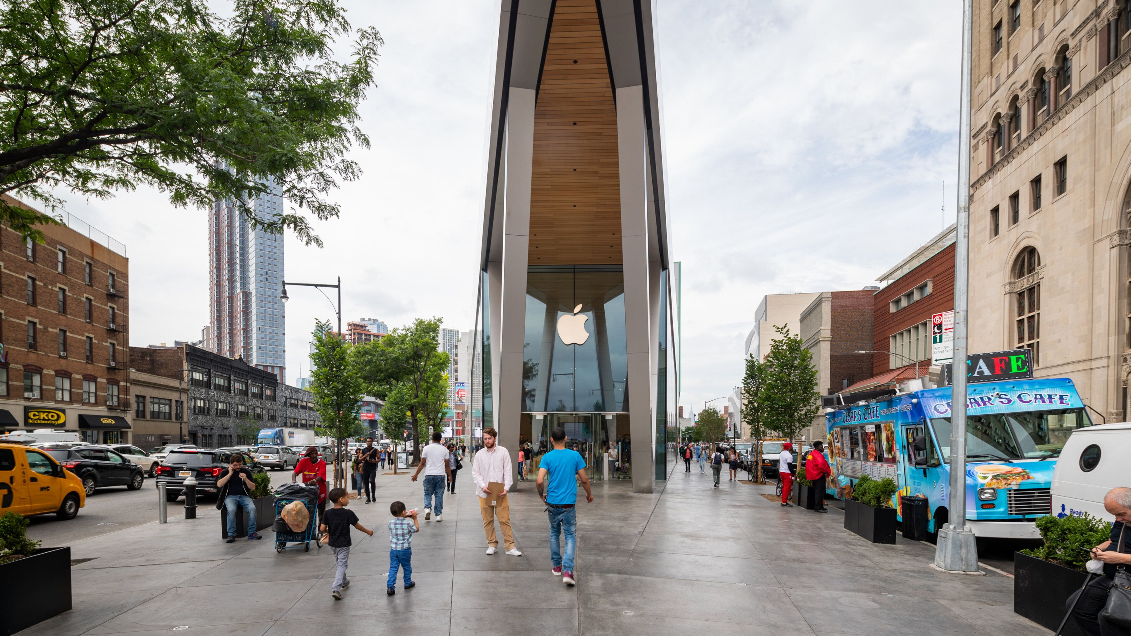 Downtown Brooklyn featuring signage and street scenes