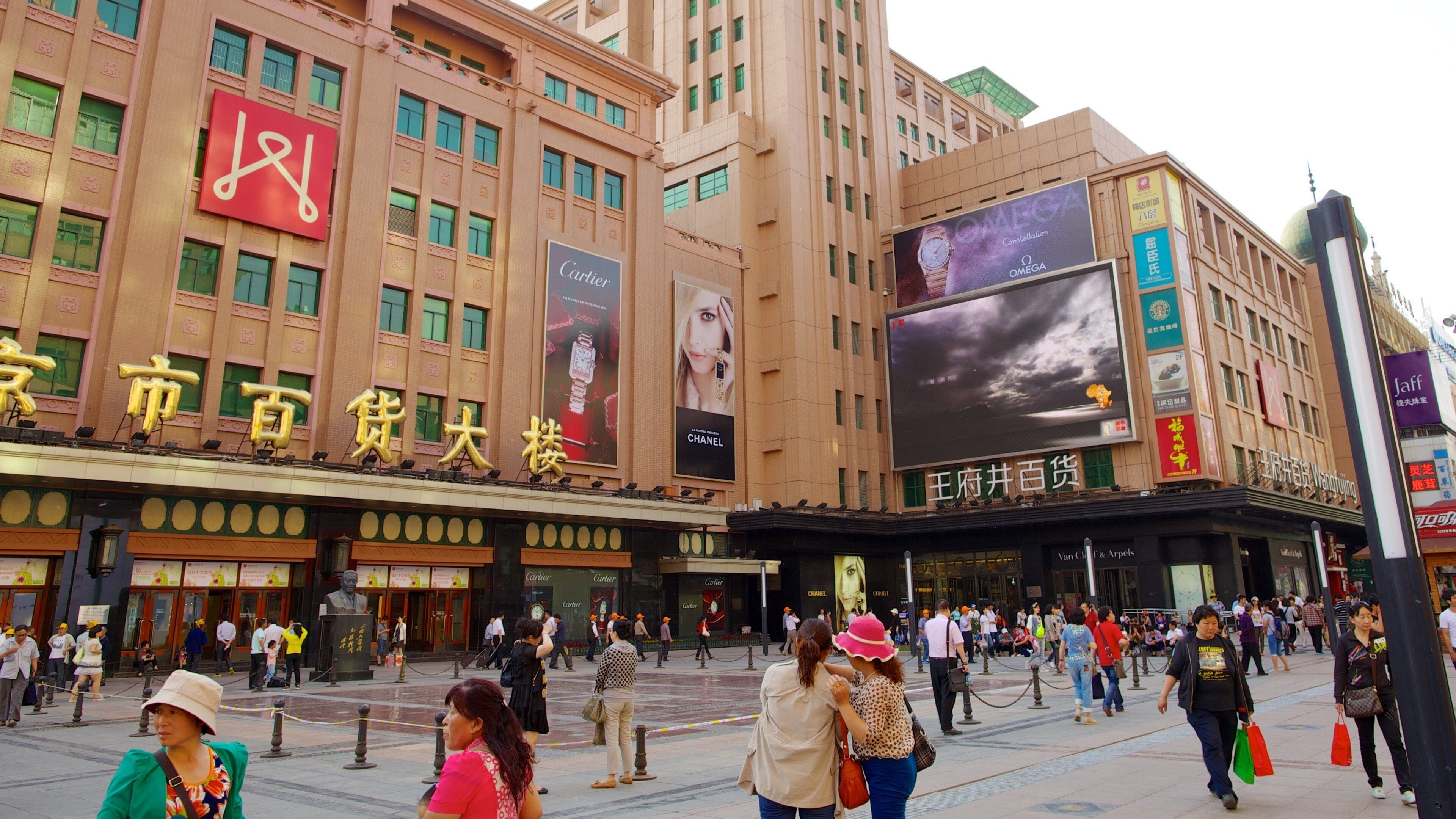Wangfujing Street showing a square or plaza, a city and signage