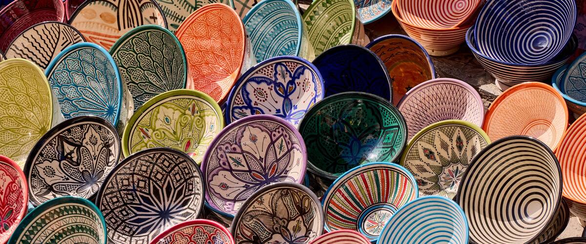 A collection of colorful, intricately designed plates.
