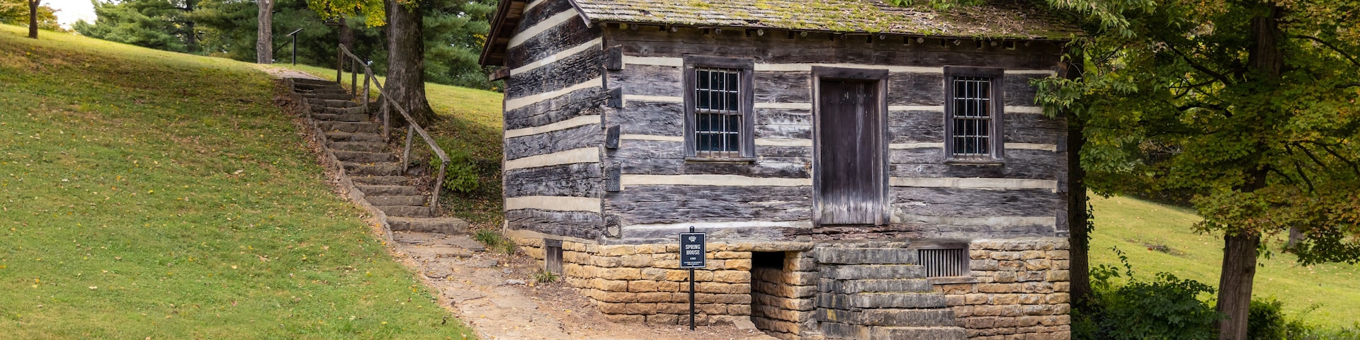 Antique small wood cabin spring house