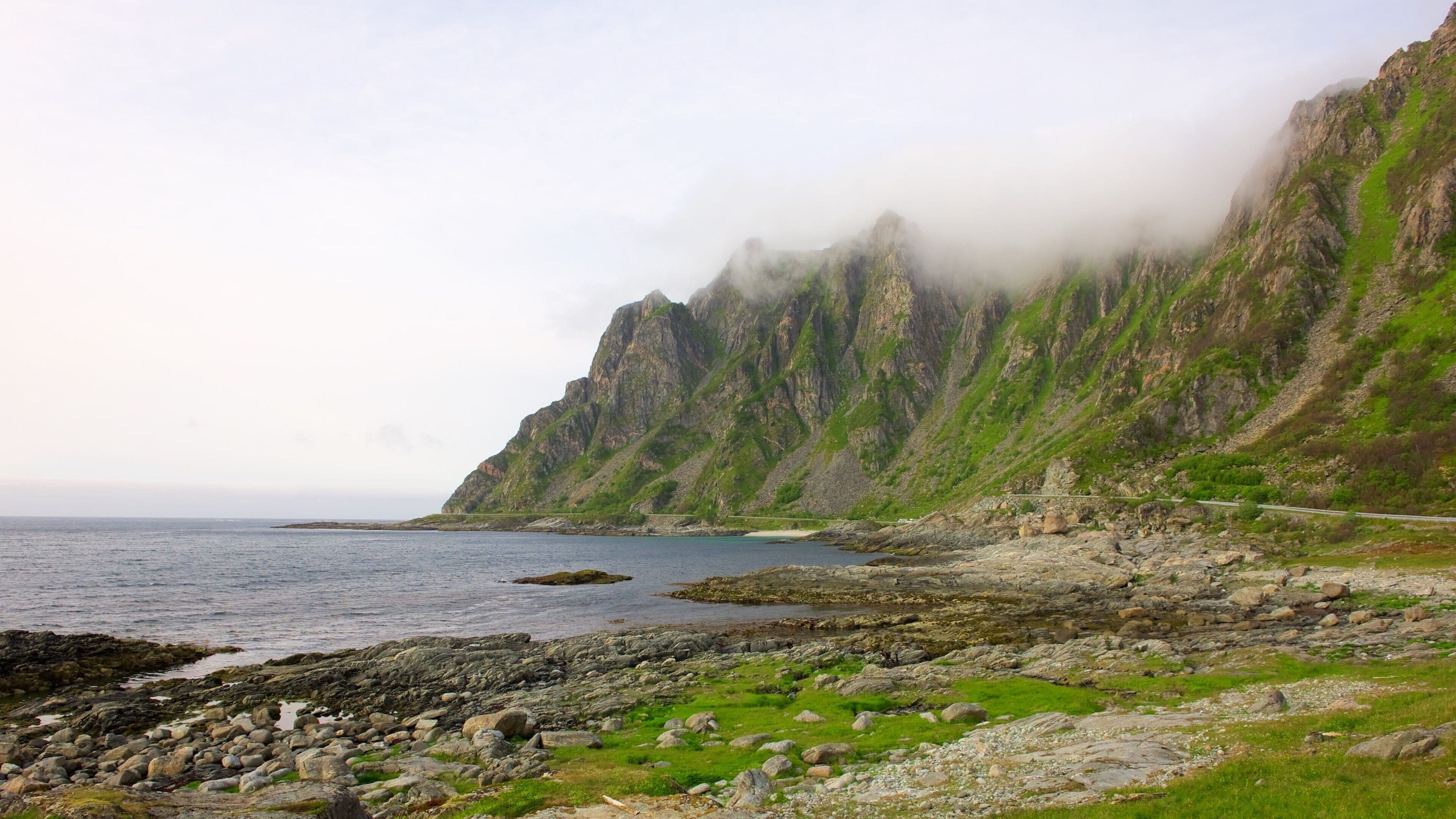 Andoy showing mountains, mist or fog and general coastal views