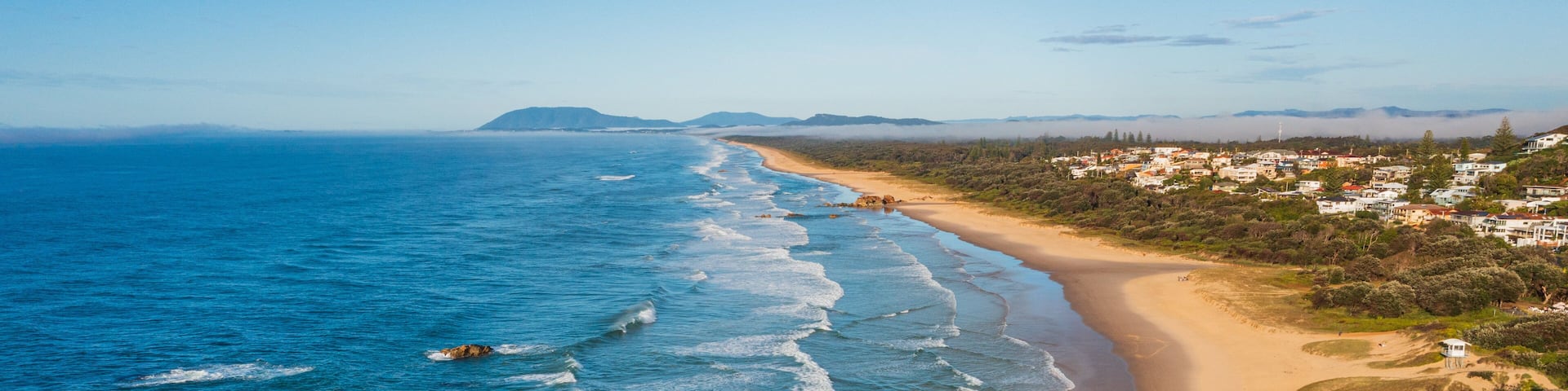 Port Macquarie which includes general coastal views, a sandy beach and landscape views