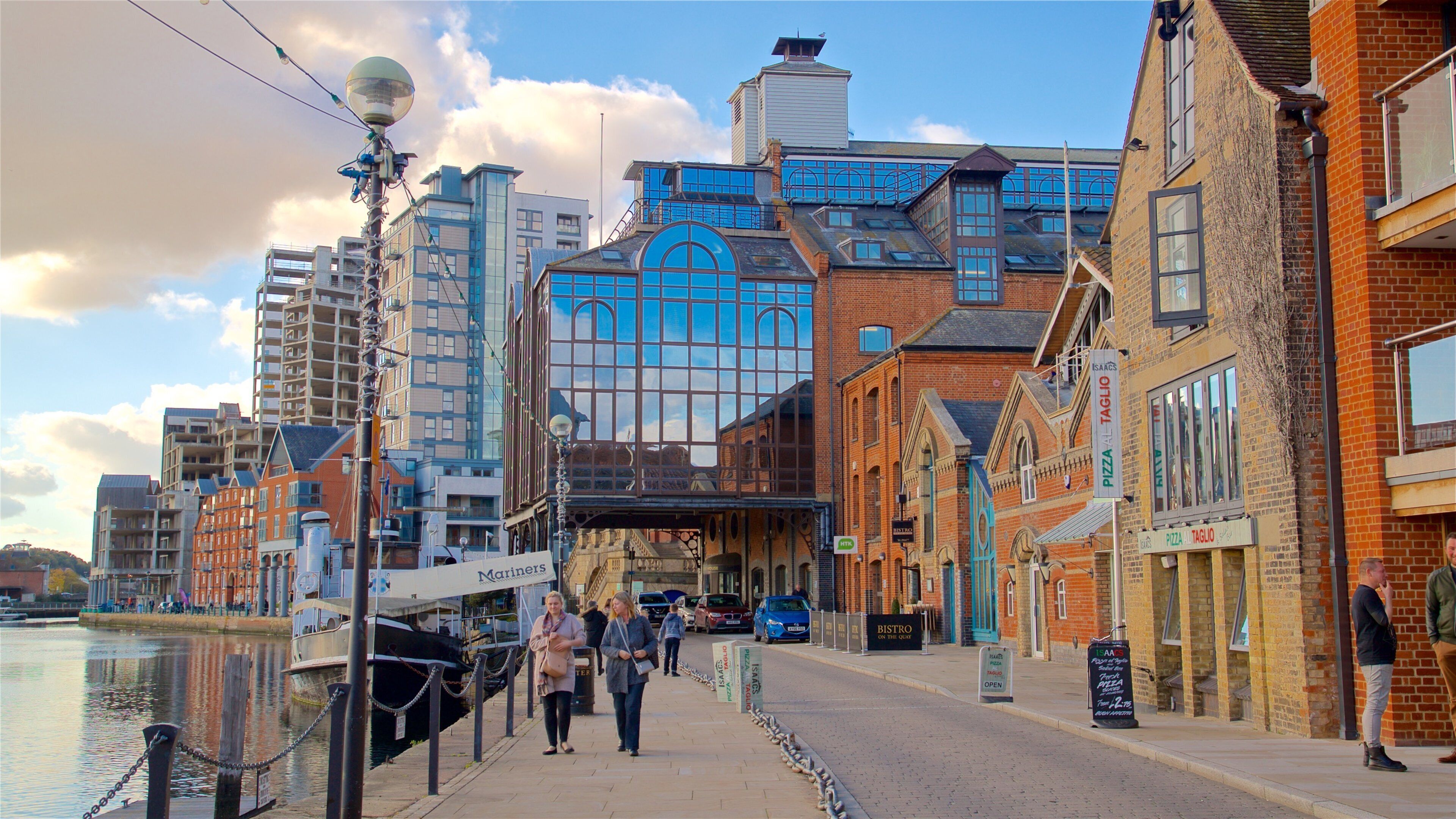 Ipswich Waterfront featuring street scenes and a river or creek as well as a couple
