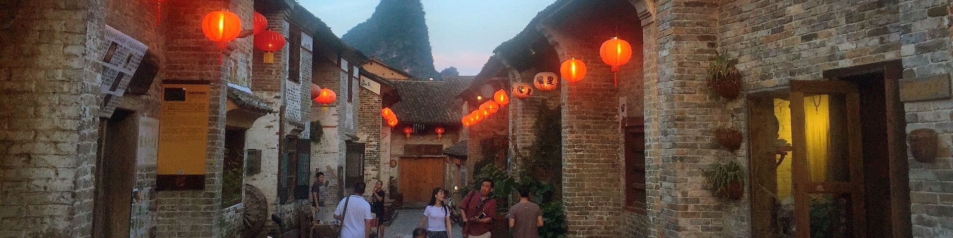 After sunset, red lanterns illuminate this little Chinese village. Huangyao 黄姚 in Guangxi, China.
