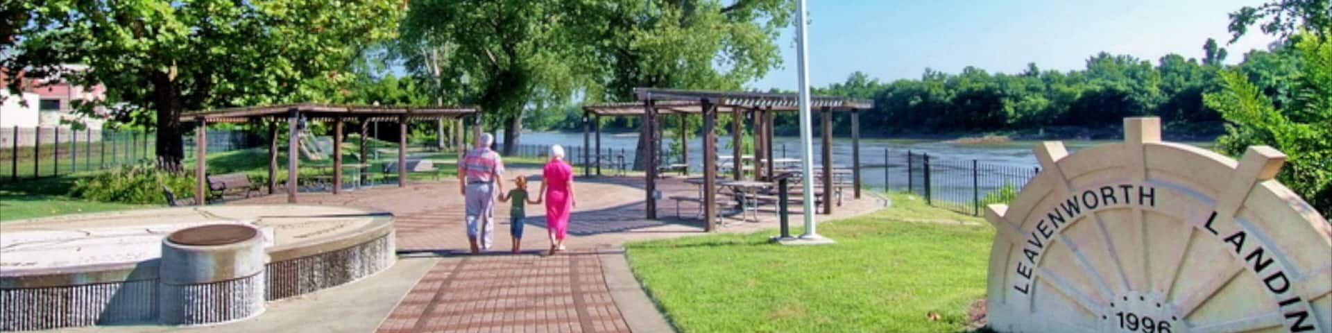Leavenworth featuring signage and a garden as well as a family