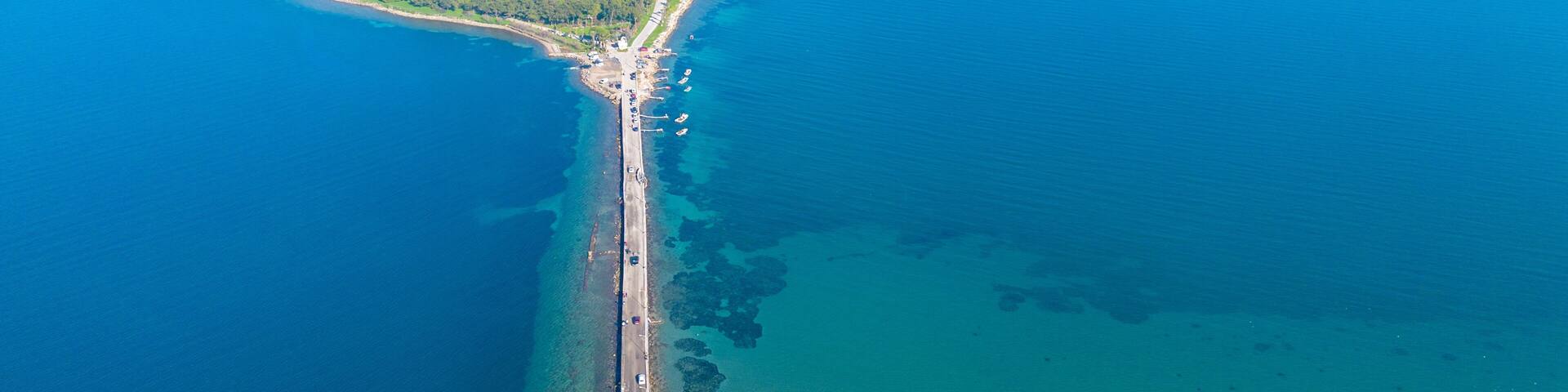 Aerial drone view of Urla district of Izmir, Turkey's third largest city. Iskele - Karantina island - Turkey