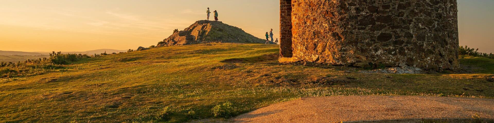 Enniscorthy which includes building ruins, a sunset and tranquil scenes