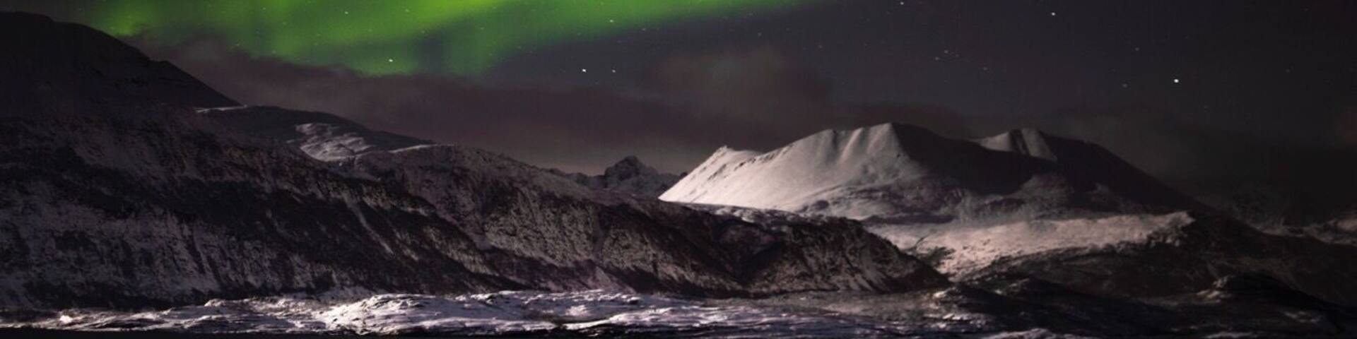 2 hours east of Tromso in the Arctic Circle. This is one of the best places to go to chase the Northern Lights. #northernlights #lights #auroraborealis #skibotn #norway #lifeatexpedia