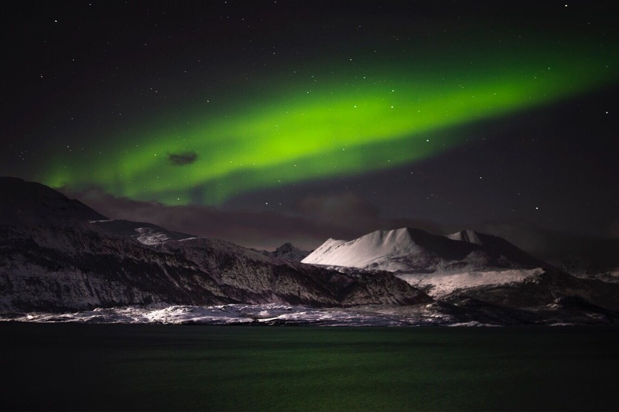 2 hours east of Tromso in the Arctic Circle. This is one of the best places to go to chase the Northern Lights. #northernlights #lights #auroraborealis #skibotn #norway #lifeatexpedia