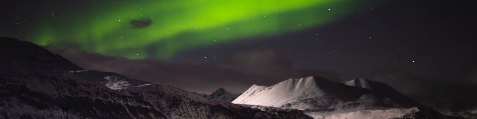 2 hours east of Tromso in the Arctic Circle. This is one of the best places to go to chase the Northern Lights. #northernlights #lights #auroraborealis #skibotn #norway #lifeatexpedia