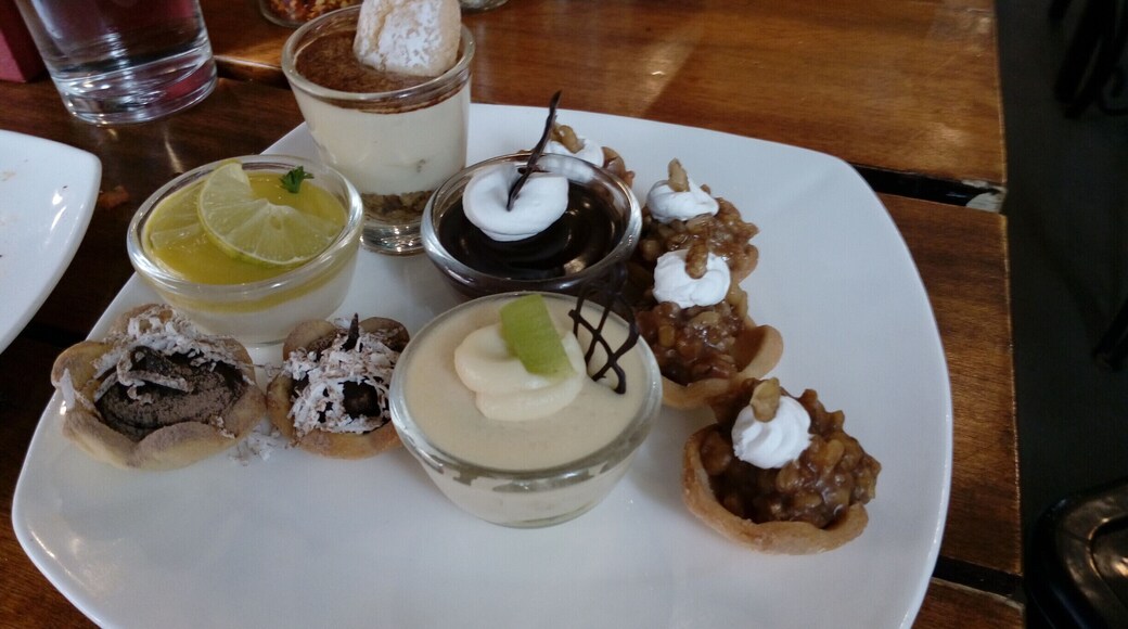 Umm. while the pizza spread is too good, the desert scene is a let down. They sure look pretty but too sweet and mar your appetite after 2/3 bites. :( #sweetspot