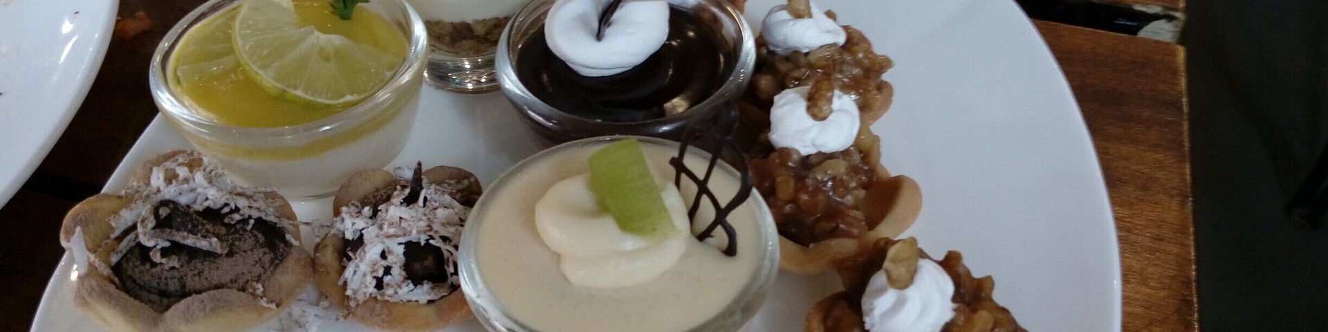 Umm. while the pizza spread is too good, the desert scene is a let down. They sure look pretty but too sweet and mar your appetite after 2/3 bites. :( #sweetspot