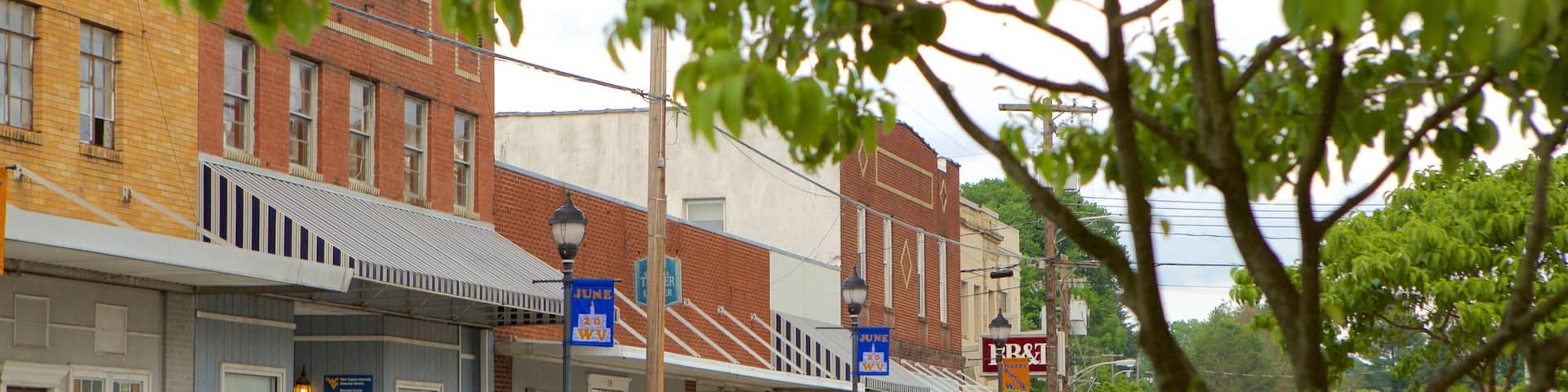 Summersville which includes a small town or village, street scenes and heritage elements