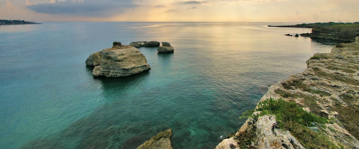 Sunrise from sicilian reef in Fontane Bianche; Shutterstock ID 87663307; Purchase Order: SP-1394 HA Batch 3 Part 1; Order Number: ; Client/Licensee: HomeAway; Other: To be paid with HA budget