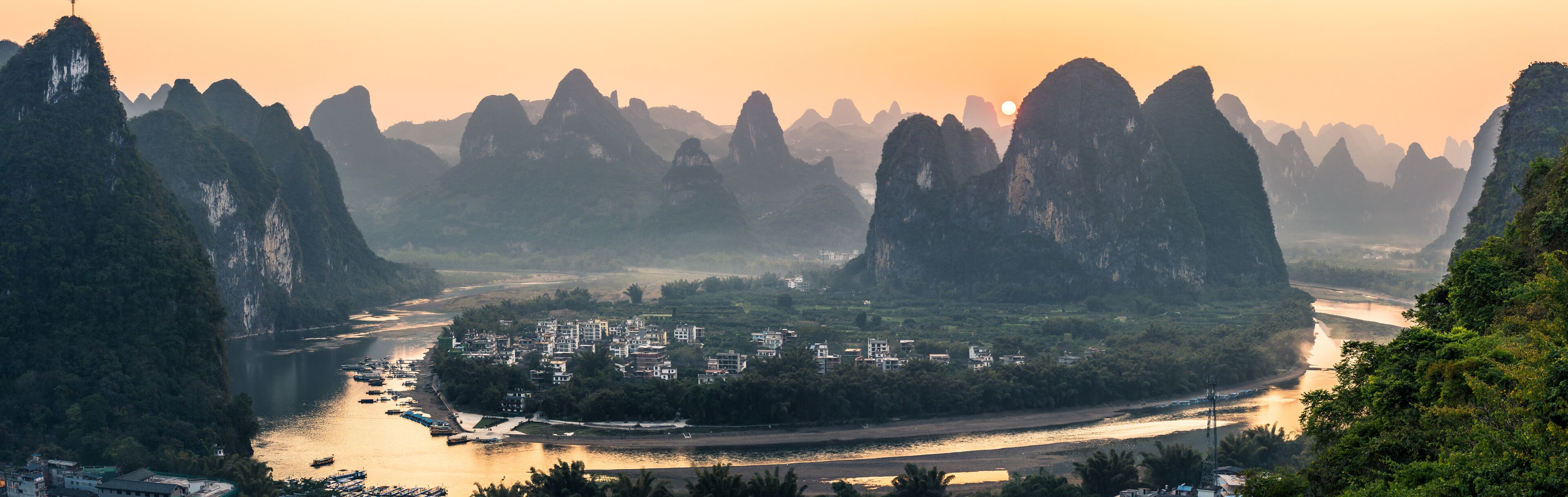 sunset in ancient town among mountains