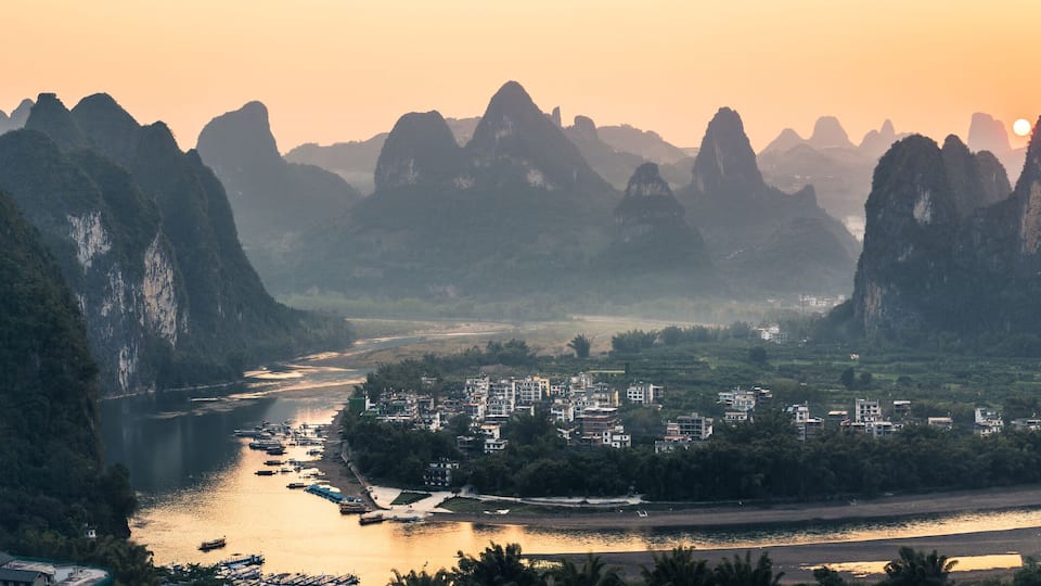 sunset in ancient town among mountains