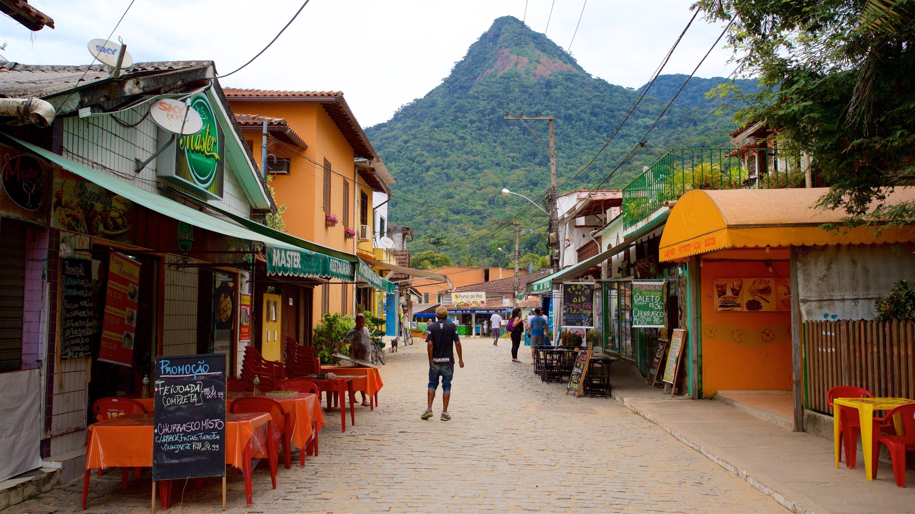 Vila do Abraao showing mountains and a small town or village