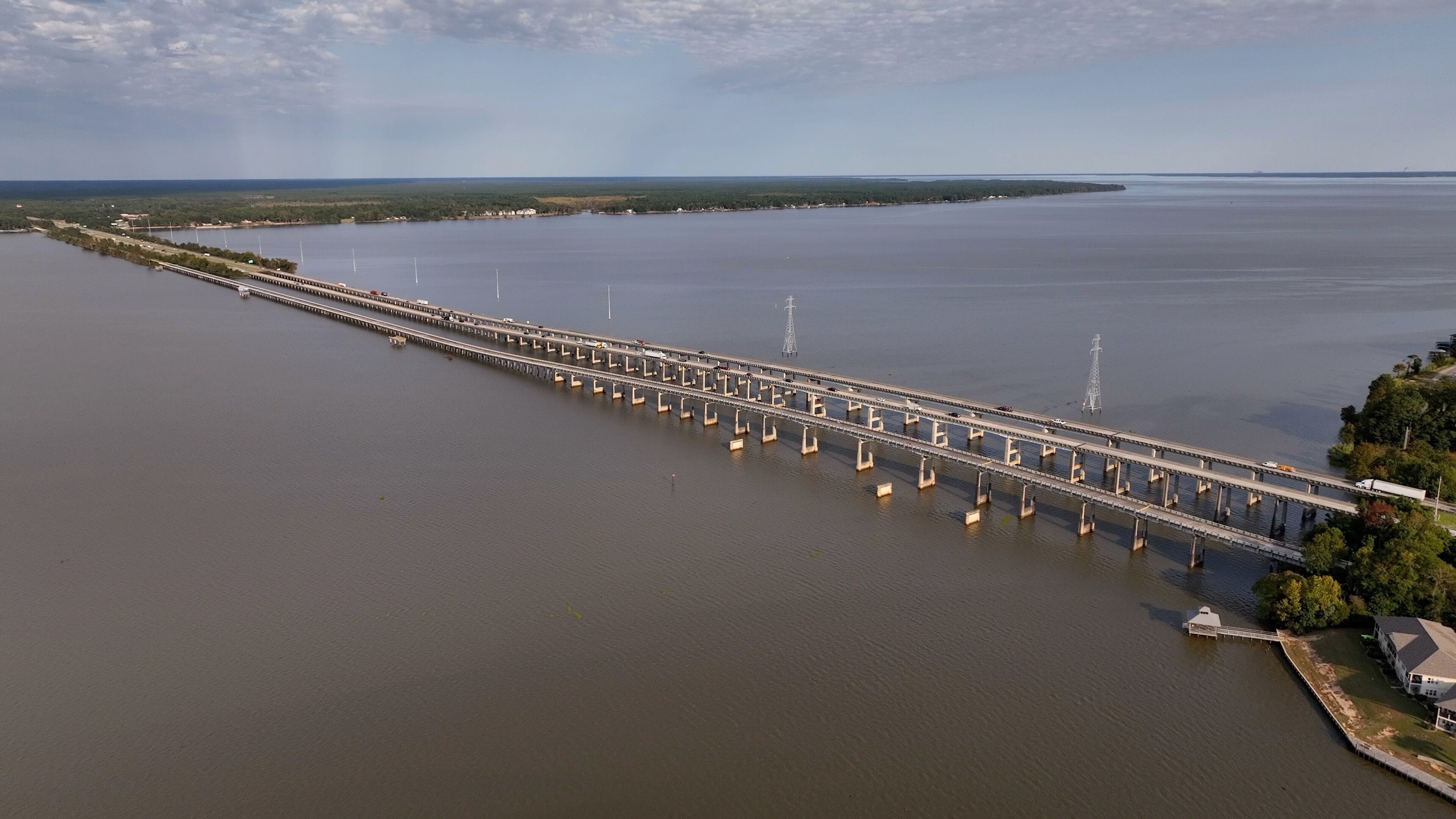 Traveling across America on interstate highway I-95 crossing Lake Marion, SC cars and trucks shipping and transportation