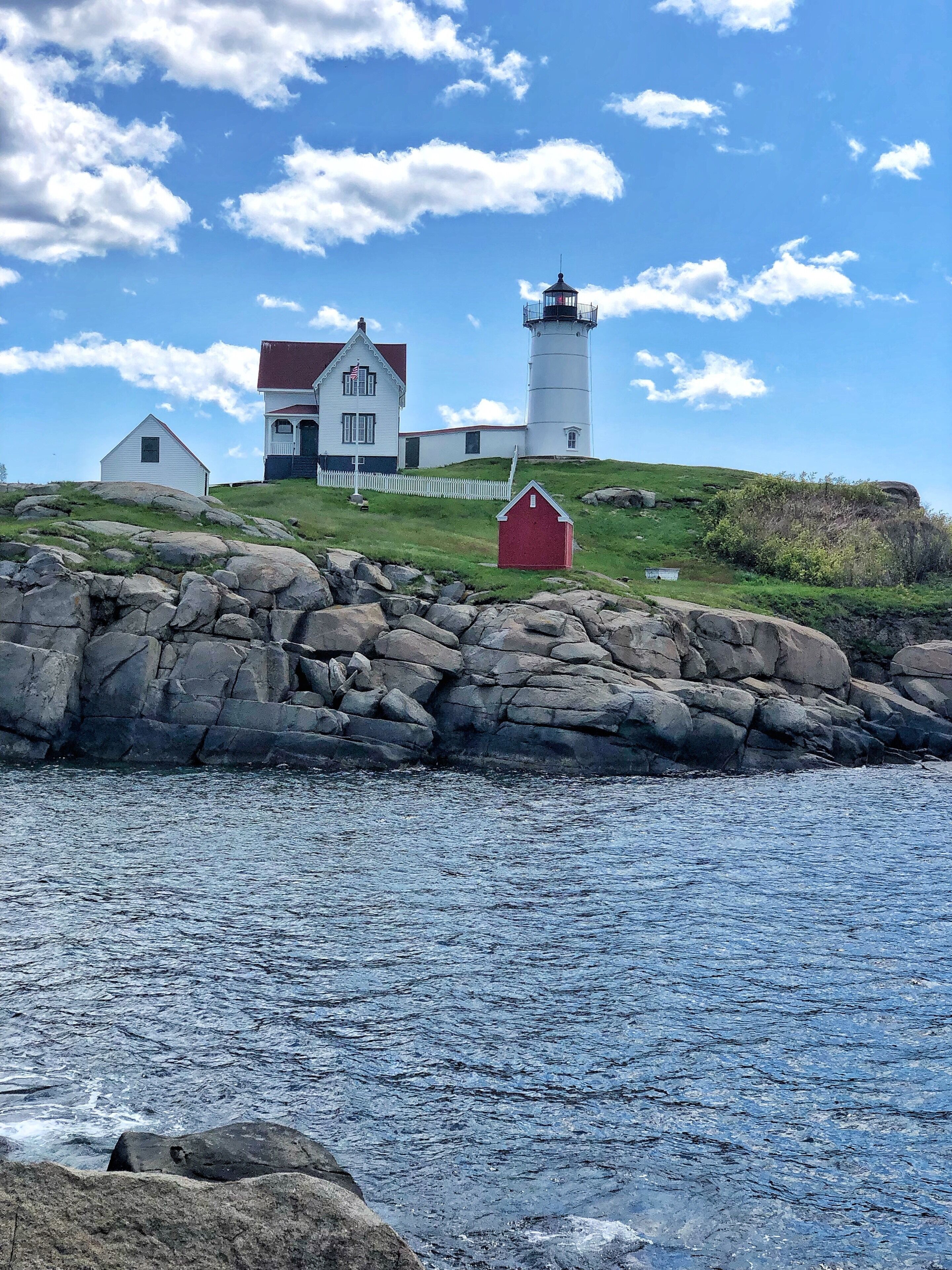 Nubble Lighthouse in York, Maine on a little island all by itself, and so cute.