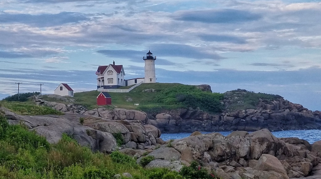 Nubble Lighthouse in York, Maine is about a 20 minute drive from the NH/ME border. Nice beaches (with very cold water!) are on each side of the peninsula where the lighthouse is located.