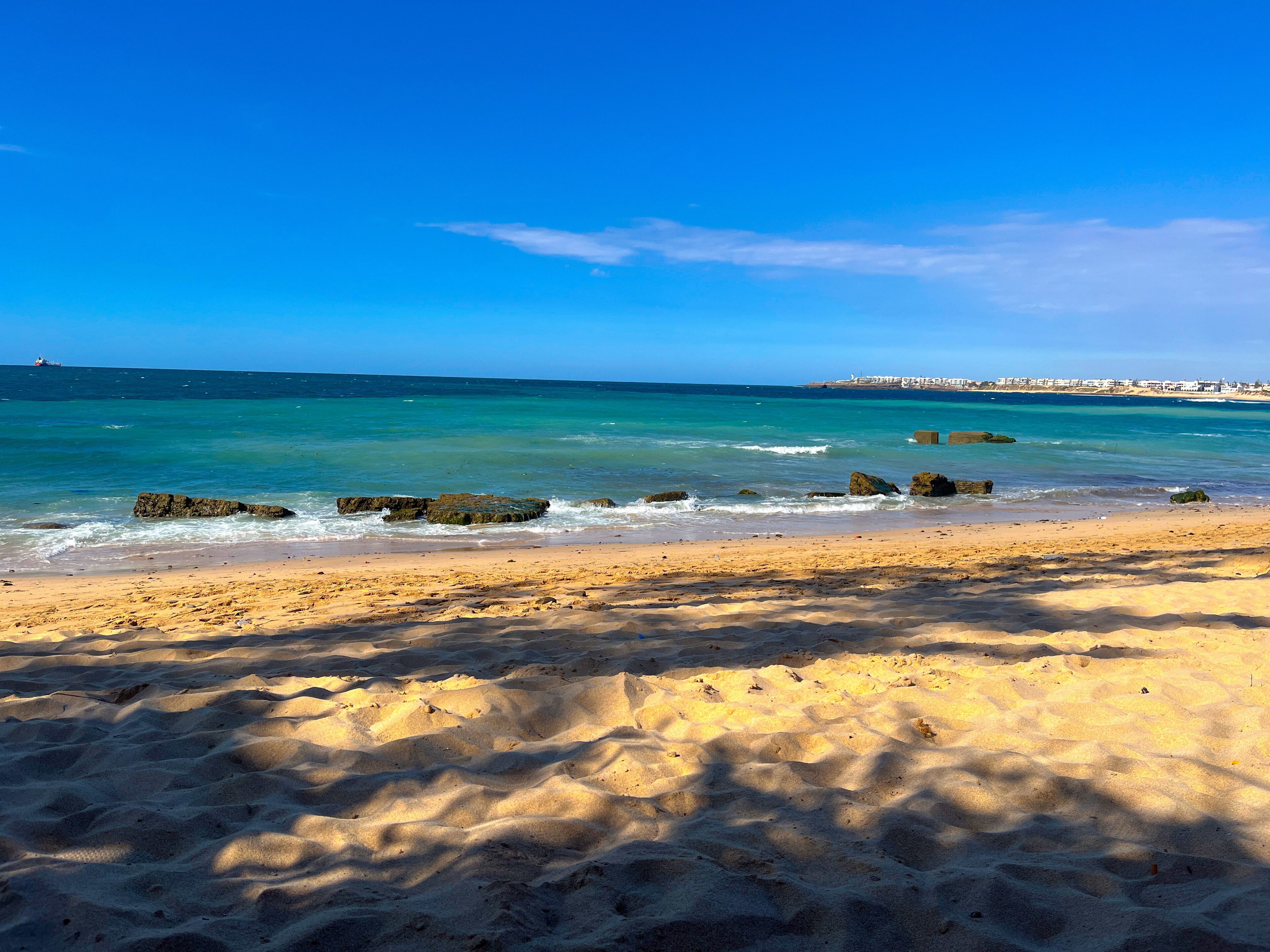 Scenic view of beach in mohammedia, morocco with turquoise water 