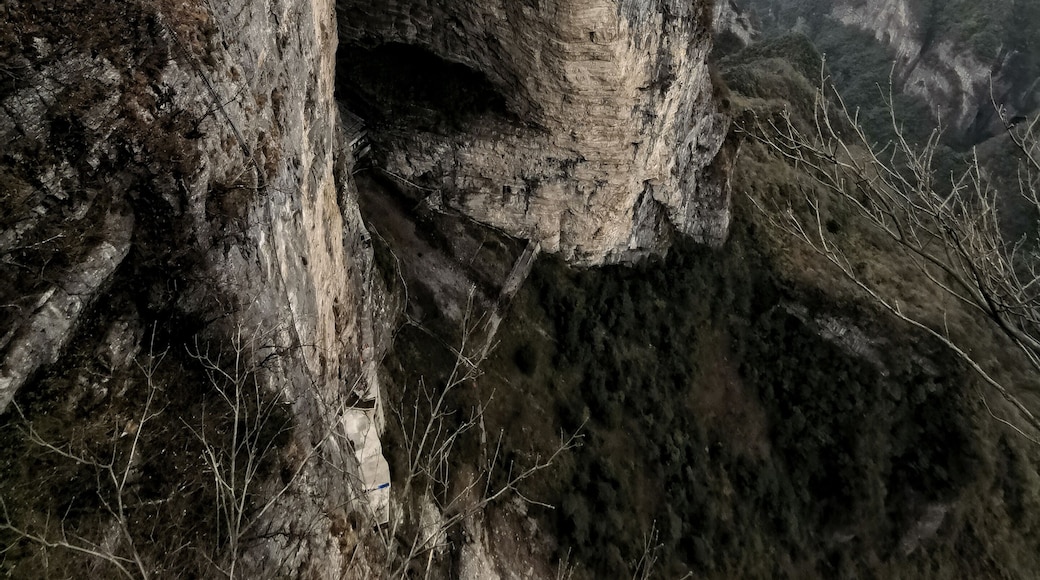 The cliff walk in Tianmen Mountain is not to be missed as this allows you to have different points of view of the giant hole in the center of the rock.