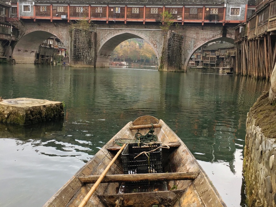 Fenghuang is a medieval period city still in tact. While you wander the shops along the river, you can picture life back then.