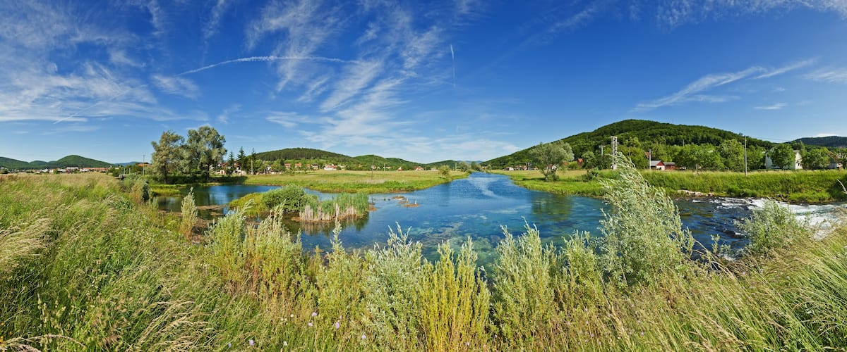 Panorama view of the flow of River Gacka near Otočac, Croatia