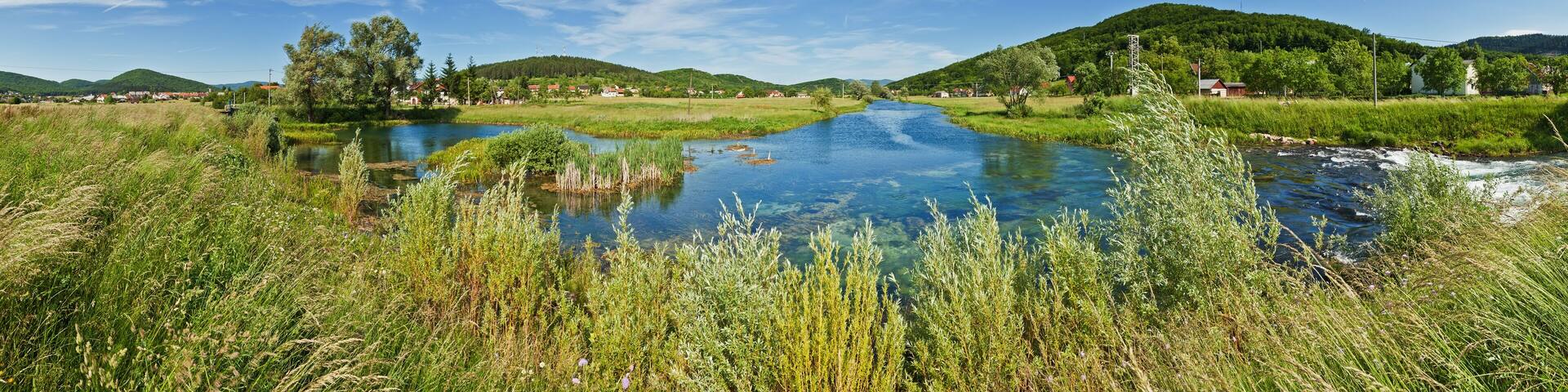 Panorama view of the flow of River Gacka near Otočac, Croatia