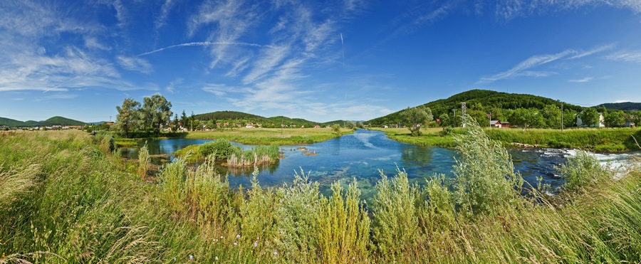 Panorama view of the flow of River Gacka near Otočac, Croatia