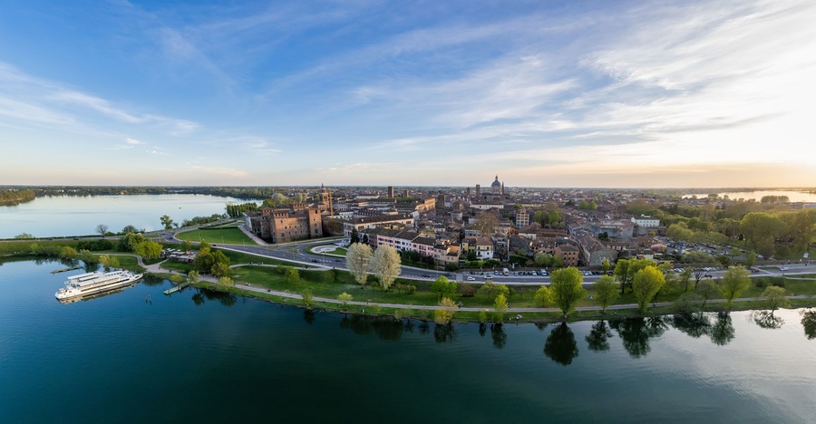 Aerial view into land of Castello di San Giorgio and cityscape at sunset, Mantua, Lombardy, Italy
