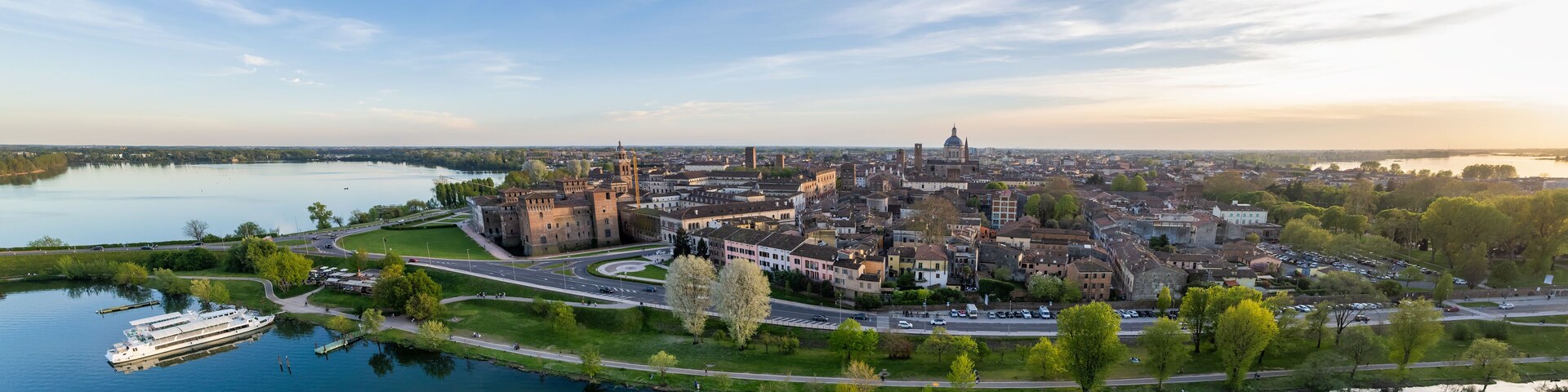 Aerial view into land of Castello di San Giorgio and cityscape at sunset, Mantua, Lombardy, Italy