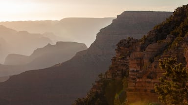 Grand Canyon which includes landscape views, a sunset and a gorge or canyon