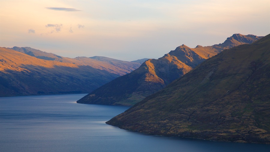 Cecil Peak showing mountains, a lake or waterhole and a sunset