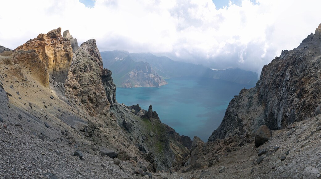 Tianchi Heaven lake and crater mountains in Changbaishan National Park China panorama