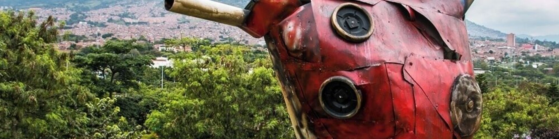 Moravia is a community within Medellin that literally grew from a municipal landfill. Impoverished residents built makeshift homes out of whatever building materials they were able to scavenge from the mountain of garbage.
Over time, a community formed, and while the government tried to push them out, the people stood strong. During the 80's, Pablo Escobar won the support of the residents by building proper homes and setting up infrastructure. Whether of the kindness of his heart or a ploy for support, the outcome was the same.
Today, with the help of the government and NGO's, the landfill is now a beautiful park with a proper community gaining strength.
This heart is one of many art displays built by the locals, from the very garbage once used to build their community.
#Colombia #Medellin