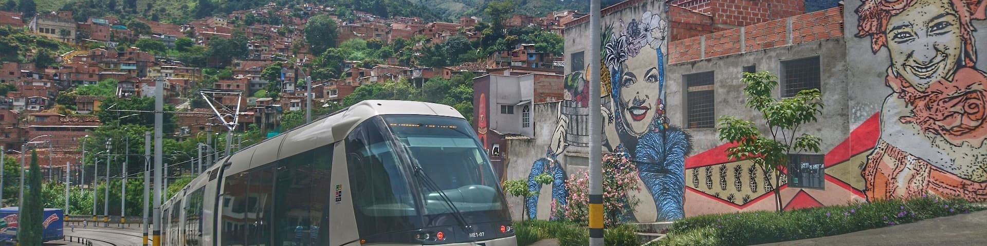 Medellín has really figured out public transportation. This is the tranvia, one of the city's newest lines. For less than a dollar it will take you smoothly and quietly into the eastern part of the city. From there you can take a cable car into the hills, or walk back past some amazing street art.