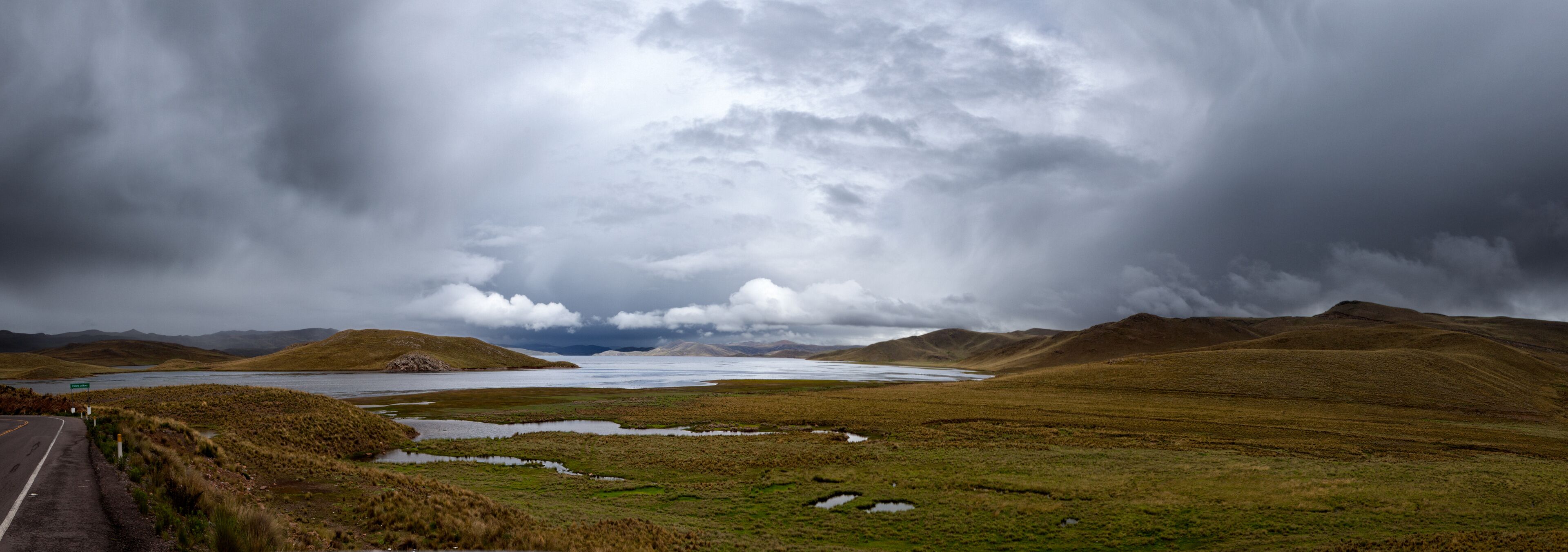 Andean lake close to a storm