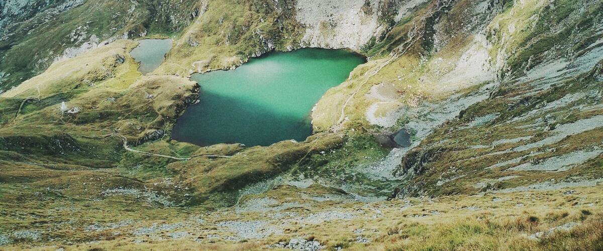 One hour trek away from the top of the Transfagarasan road, you'll find peace and quiet. You'll also be almost in the middle of the Fagaras ridge trail, one of the more serious challenges for mountain lovers around here.
#romania #fagaras #mountains