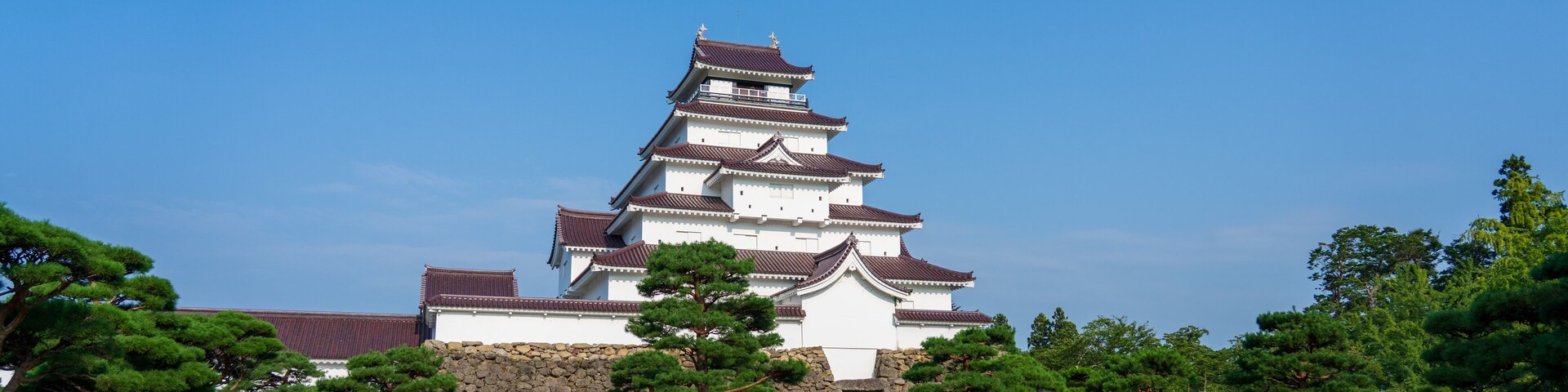 Facade of the Tsuruga Castle in the morning in Fukushima, Japan