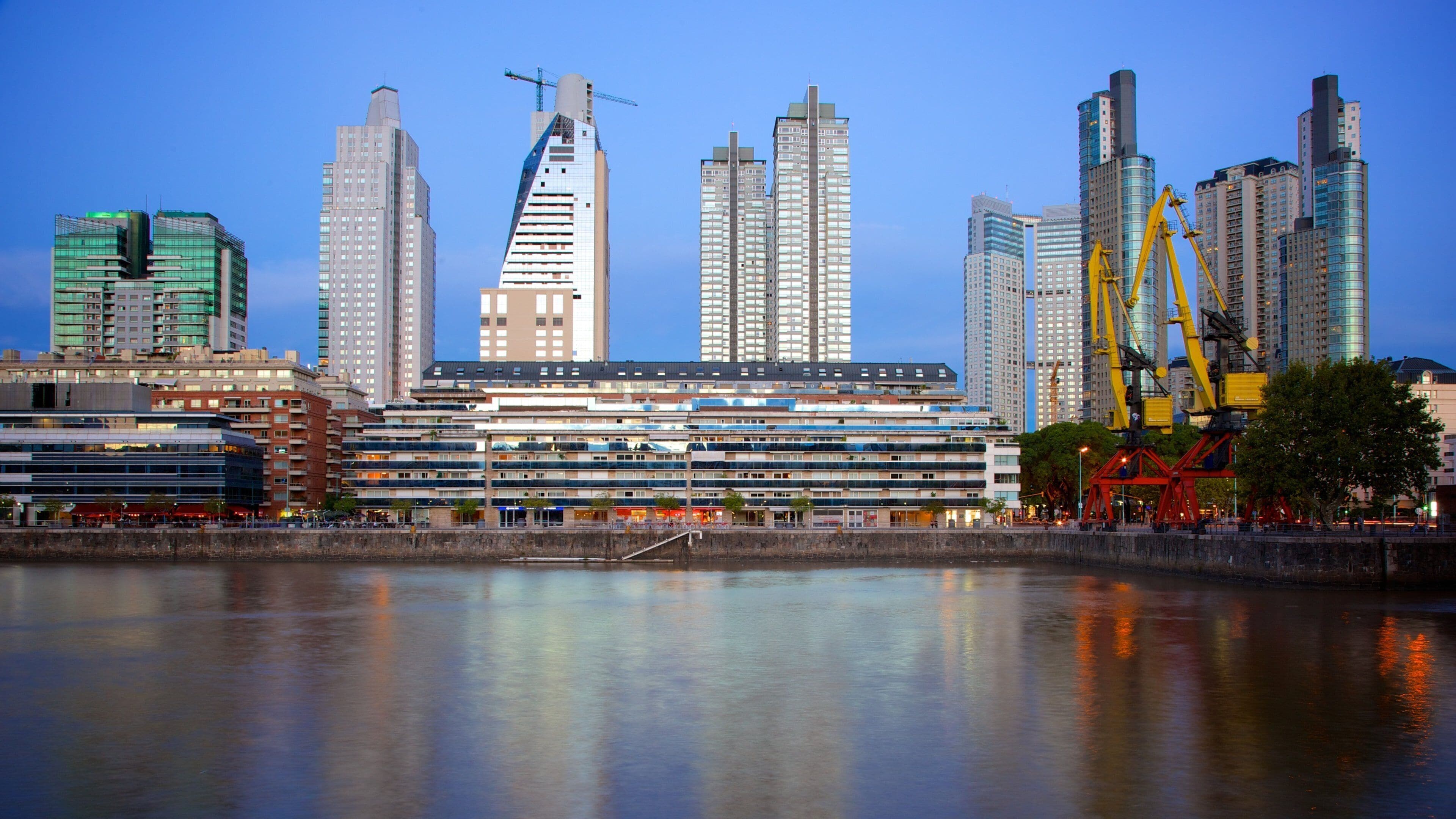 Puerto Madero featuring a city, night scenes and a river or creek